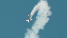 Skybound Stunt Plane Extravaganza. Stunt plane flies in the sky