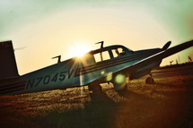 single engine airplane in a field