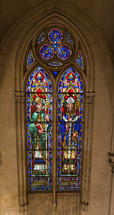 stained glass window from a church, featuring two biblical figures