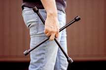 a man holding a lug wrench