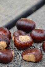 chestnuts on wooden planks