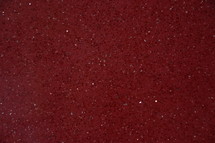 artificial bright red stone surface as neutral background
