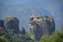 ancient but still inhabited Meteora Monastery built high on rock plateau in Greek