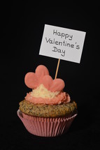 Cupcake for my sweetheart. 
cupcake, in love, love, Valentine, couple, Valentine's Day, February, 14, enamored, amorous, fond, lovestruck, twosome, relationship, romance, heart, hearts, delicious, tasty, yummy, pink, rose, celebration, invitation, cupcakes, joy, food, eat, eating, sweet, festivity, invite, present, gift, homemade, home made, home-made, self, self-made, bake, baking, baker, pastry, cook, confectioner, coffee cake, celebrate, celebrating, feast, enjoy, relish, savor, appreciate, creme, topping, happy, sign, plate, tag, written, writing, write, words, word, greeting, greetings