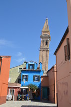 blue house and distant steeple 