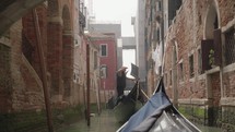 POV ride atmosphere of the canal in Venice as seen from a gondola Venice Italy