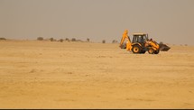 bulldozer in a desert 