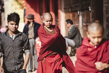 monks walking the streets of Tibet 