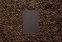 coffee beans background with paper 