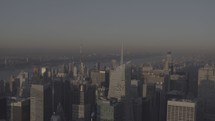 aerial view over the NYC skyline in fog 
