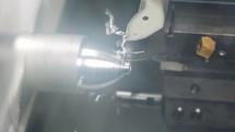 Metal lathe close-up. production of high precision metal parts