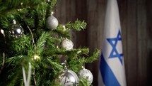 Israel flag near Christmas tree