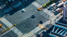 Time-lapse of busy intersection with traffic and people in Toyosu, Tokyo, Japan
