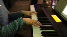 playing a piano during a worship service 