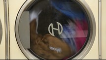 clothes spinning in a washing machine 