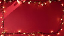 Light moving around a red Christmas background 