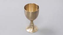 Communion cup on white background
