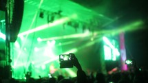 filming a concert with cellphones