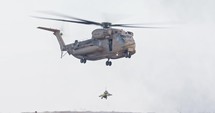 Large helicopter during a military rescue mission