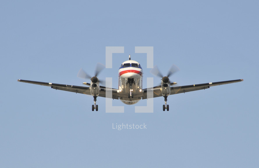Commercial airplane in flight. Turbo prop, American Airlines.