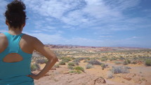 woman viewing a desert oasis 