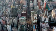 Aerial view of Hong Kong city scape in Kowloon. Street with traffic.	
