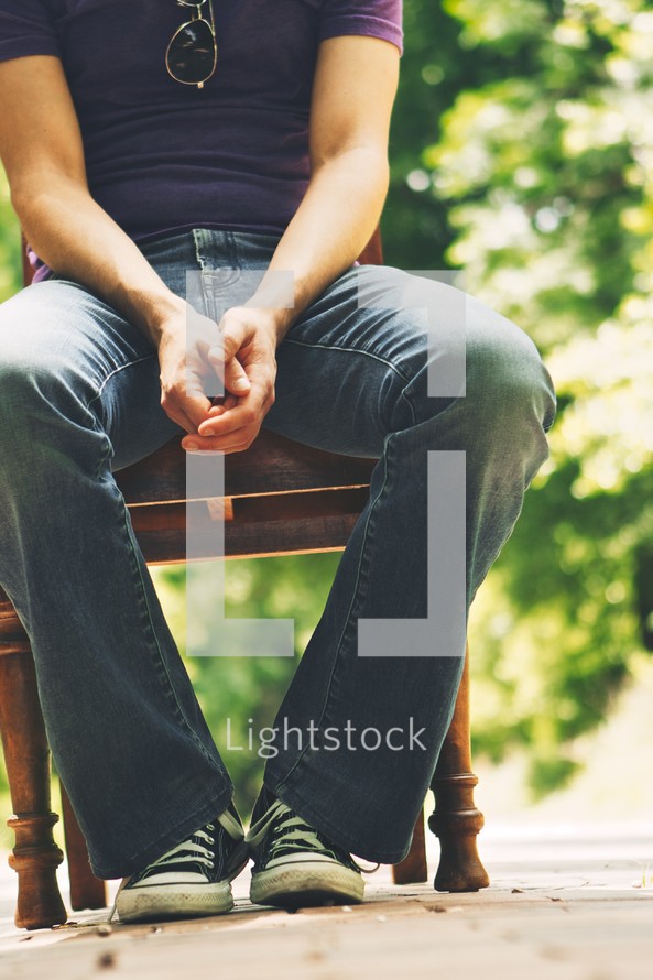 A man sitting in a chair.