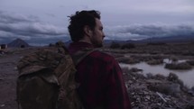 a man backpacking alone 