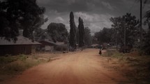 dirt road and village in Africa 