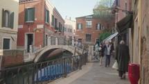 Many tourists crowd every corner of the city of Venice.