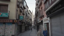 Narrow Alley Street in Old Quarter and The Cathedral Santa Iglesia Catedral Primada de Toledo Spain