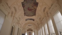 Paris, France - March 20, 2024: The ceiling decorations inside the Petit Palais, Paris, showcase intricate paintings, artistic designs and statues.