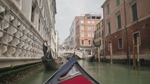 POV ride atmosphere of the canal in Venice as seen from a gondola Venice Italy