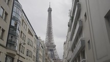 Paris, France - The Tour Eiffel Tower La dame de fer seen from an Alley Street
