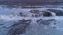 Aerial video of a waterfall near the Herðubreið volcano in the highlands of Iceland.