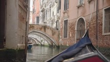 POV ride atmosphere of the canal in Venice as seen from a gondola Venice Italy