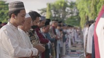 Thousand of Muslim Muslims Gather Celebrate Islam Eid al-Fitr Salah Praying in a Park in Denpasar City Bali, Indonesia