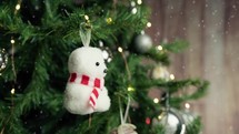 Christmas tree with small polar bear as decoration 