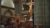 Statue of a crucifix inside a Catholic cathedral in Mexico.
