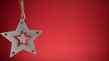 Star Christmas decoration with red background 