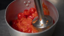 Kitchen Mixer Used To Smash Tomatoes 
