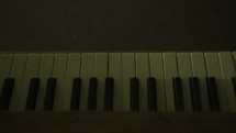 piano in a dark room 