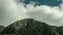clouds moving over a mountains time-lapse 