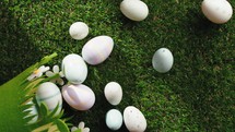 Easter Eggs Fall Down On Green