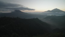 Sunrise in Kintamani Bali Indonesia Coffee Shop looking at Mount Batur Volcano Blanket Clouds in the Morning
