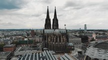 4k drone footage approaching the historical, gothic style Cathedral in Cologne, Germany.