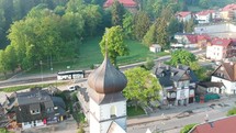 aerial view over a church and suburbs 