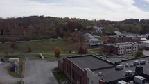 Drone over fall foliage in small town