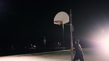 playing basketball at night 