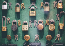 collection of padlocks and keys 